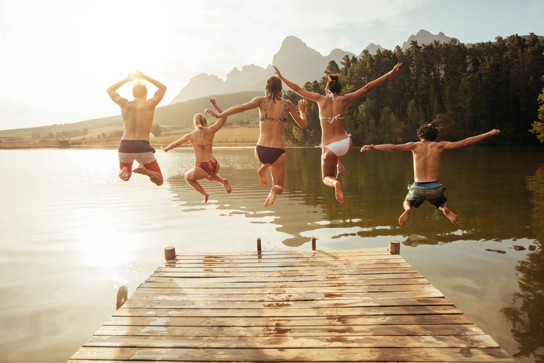 Friends Jumping into Lake 